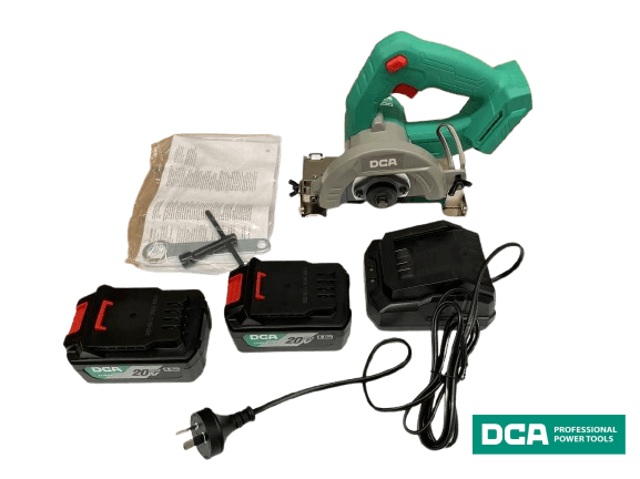DCA ADZE125 20V Cordless Brushless Marble Cutter with accessories, including batteries and charger.